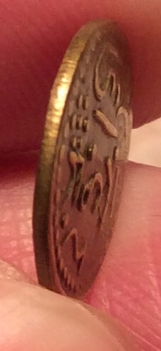 Small-Gold-Colored-Coin-With-A-2-On-It?-No-Clue-What-It-Is.